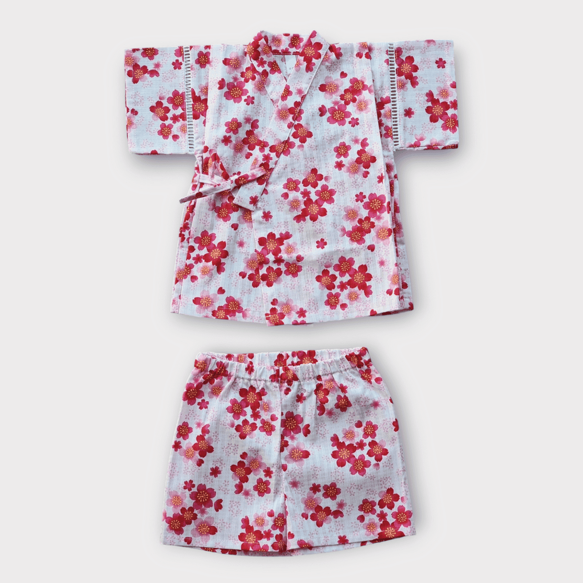 Rosa Jinbei mit Kirschblüten Gr. 80