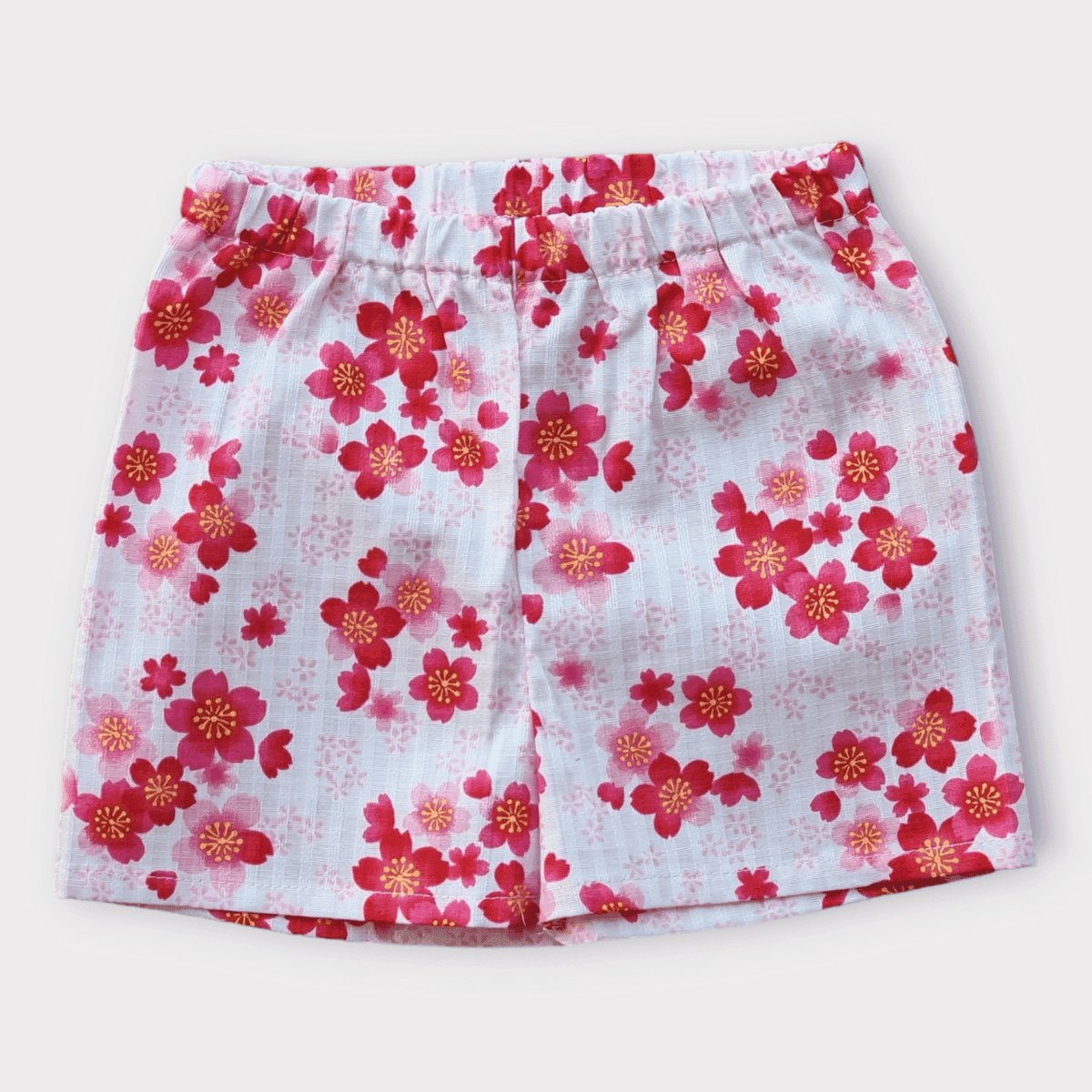 Rosa Jinbei mit Kirschblüten Gr. 80