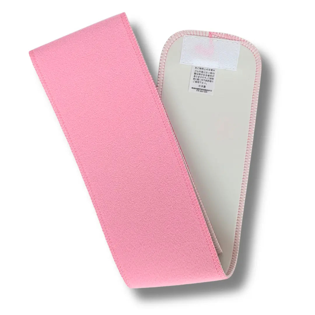 Rosa Datejime Magic Belt in geöffneter Ansicht mit heller Innenseite und Klettverschluss zum Fixieren eines traditionellen Kimonos.