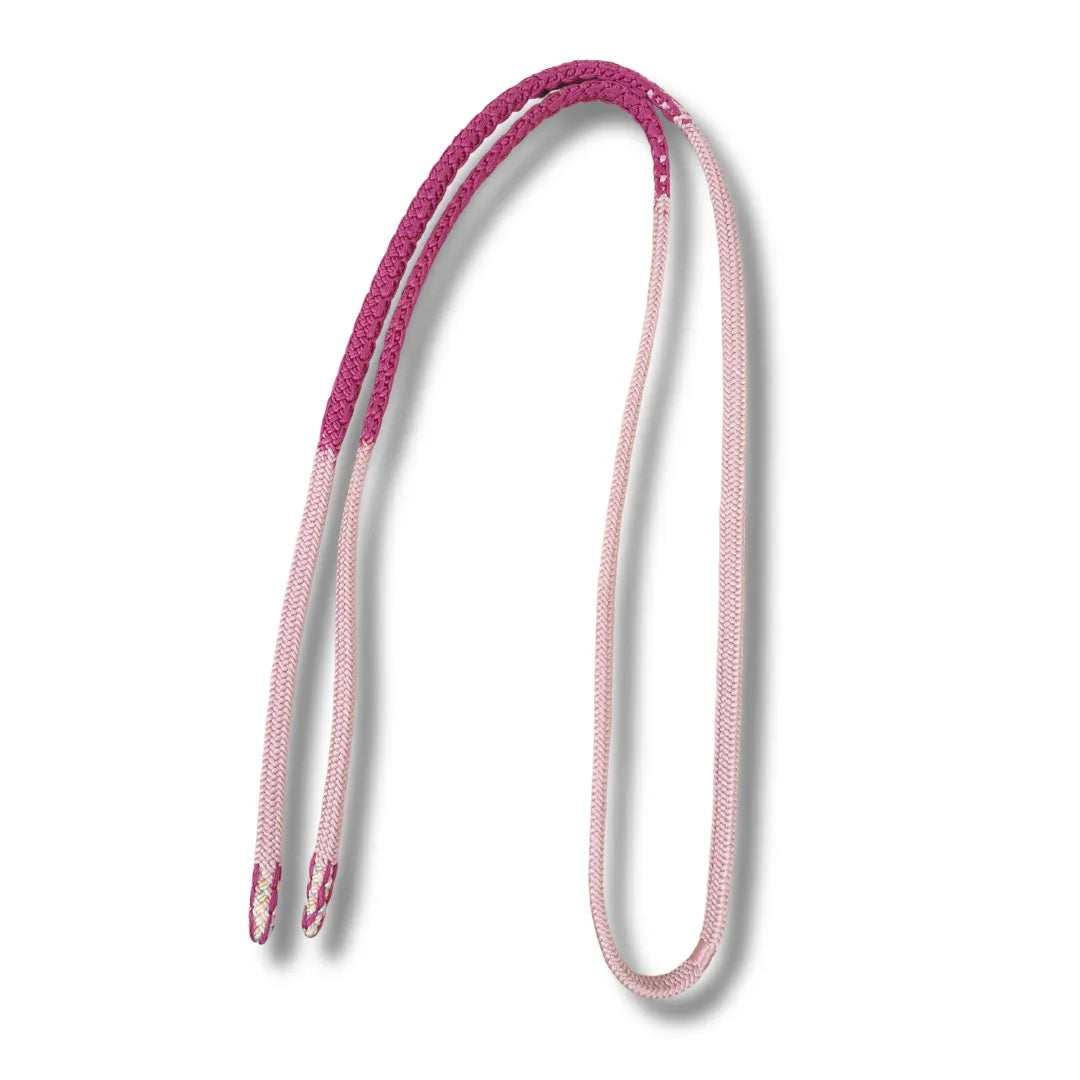 Hellrosa flaches Band als Bogen gelegt, oberer Teil in gesprenkeltem Beerenpink