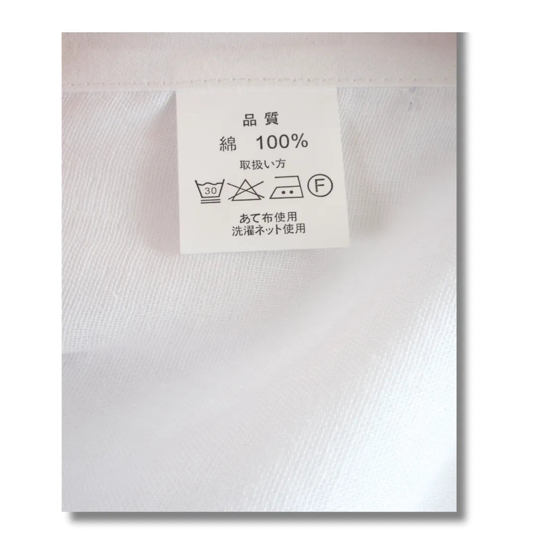 Japanisches Pflegeetikett des Hadajuban: 100 % Baumwolle, Wäsche bei max. 30 °C