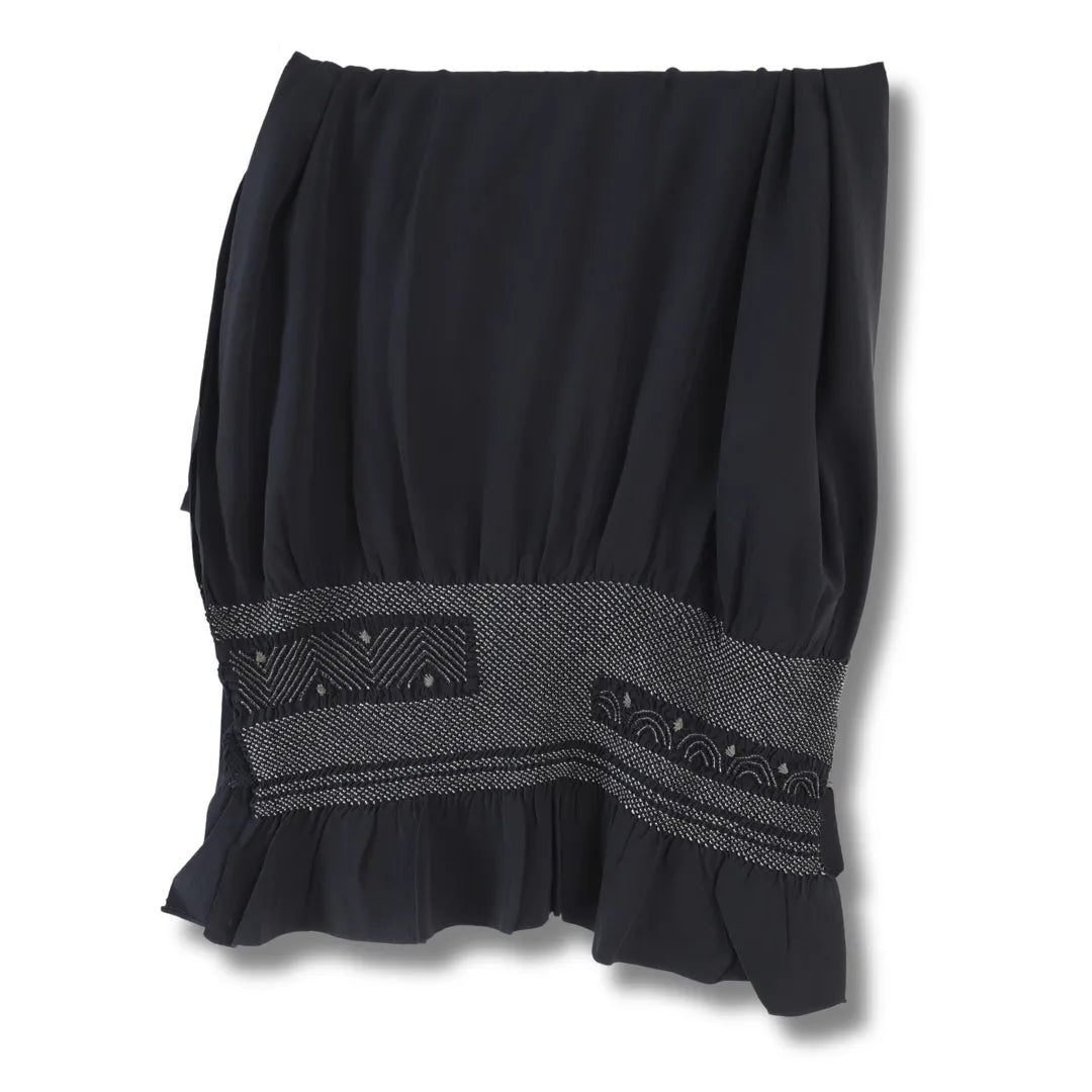 Schwarzer Vintage Heko Obi zusammengelegt, mit sichtbaren Shibori-Bereich