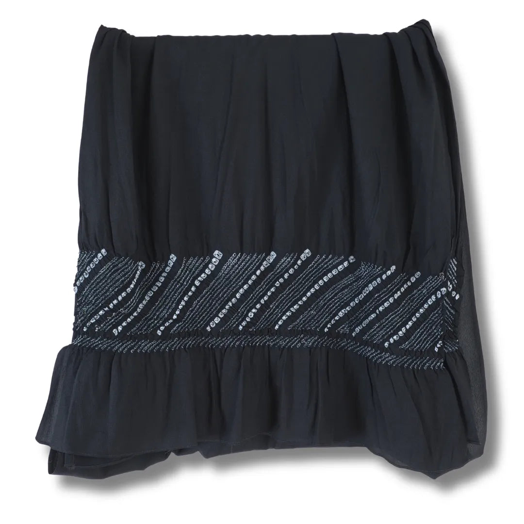 Schwarzer Vintage Heko Obi zusammengelegt, mit sichtbaren Shibori-Bereich am Ende