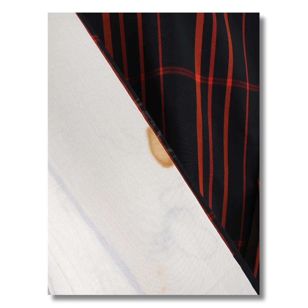 Detailaufnahme Innenfutter mit Fleck