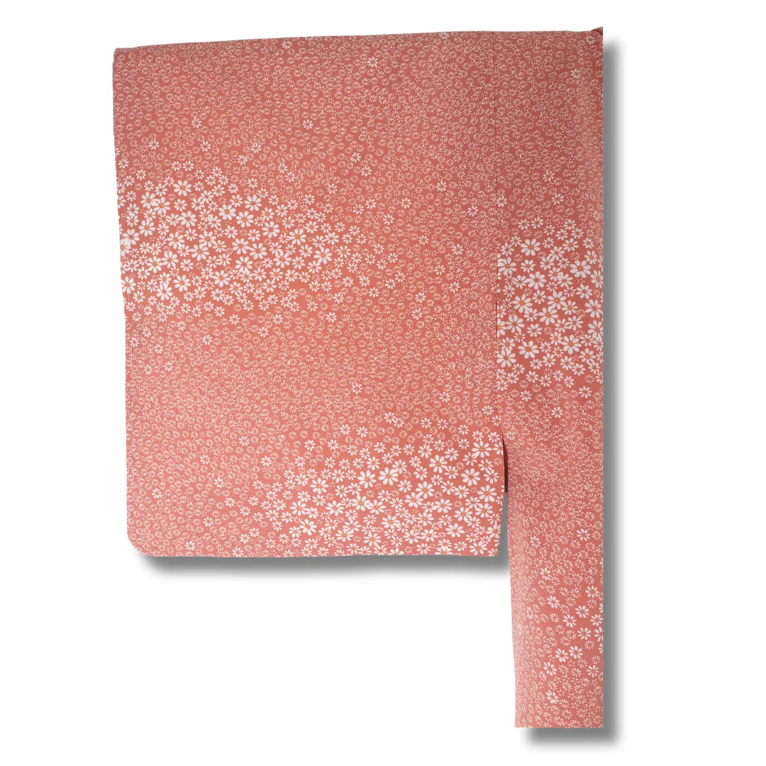 Detailansicht Stoff mit dichtem Blumenmuster in Pfirsich