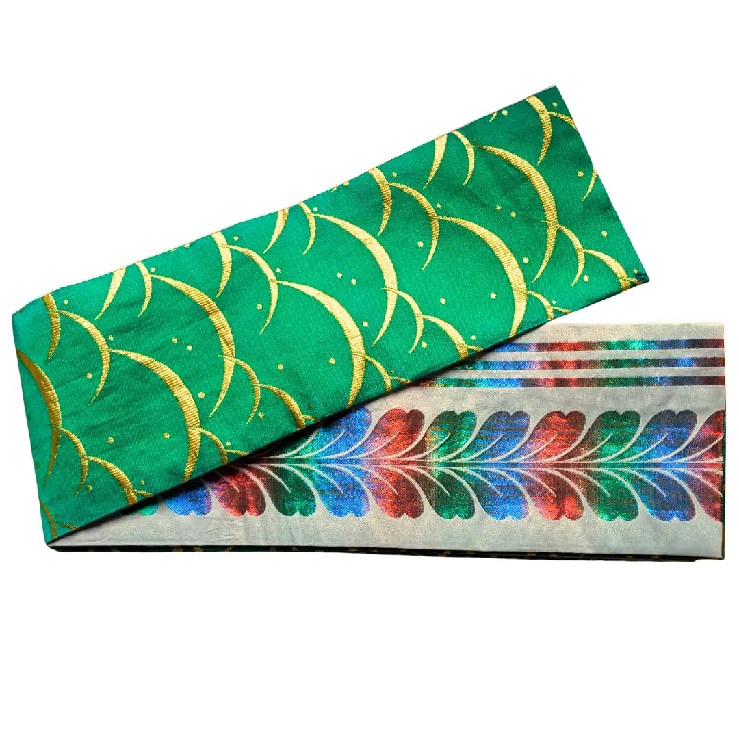 Vintage Hanhaba Wendeobi mit grünem Tsuyu Shiba Muster und farbenfroher Rückseite.