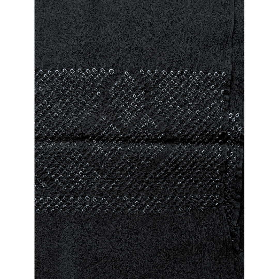 Detailaufnahme des schwarzen Vintage Heko Obi mit handgearbeitetem Shibori-Sechseckmuster